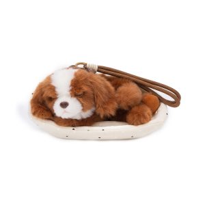 Plush brown-and-white sleeping puppy toy accessory with soft faux fur and a handy carrying strap.
